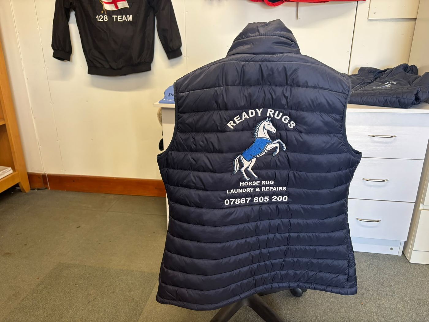 Navy gilet personalised with the Ready Rugs horse logo
